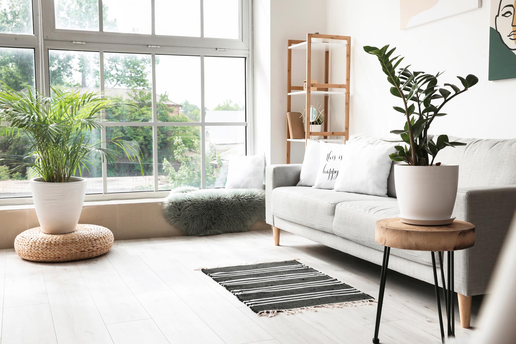 A photo of a living room with large windows - Carolina Heating Service Inc. A photo of a living room with large windows